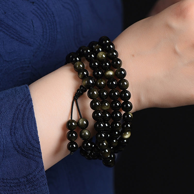 Bracelet de richesse en obsidienne naturelle dorée avec 108 perles de Mala Buddha Stones