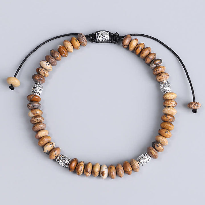 Bracelet en fil de perles positives en jaspe photo
