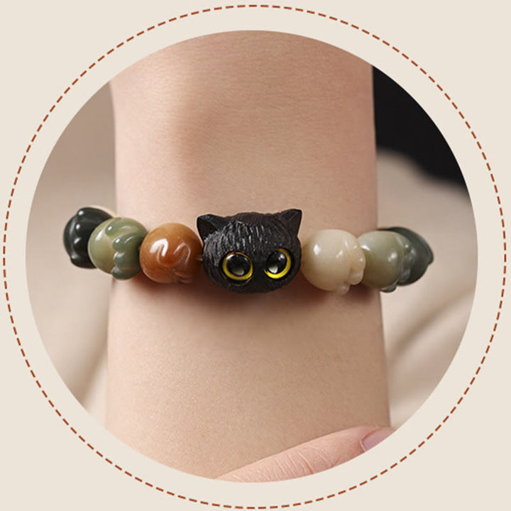 Bracelet de sagesse porte-bonheur en bois d'ébène avec de belles pattes et des graines de Bodhi naturelles de Buddha Stones - image 13