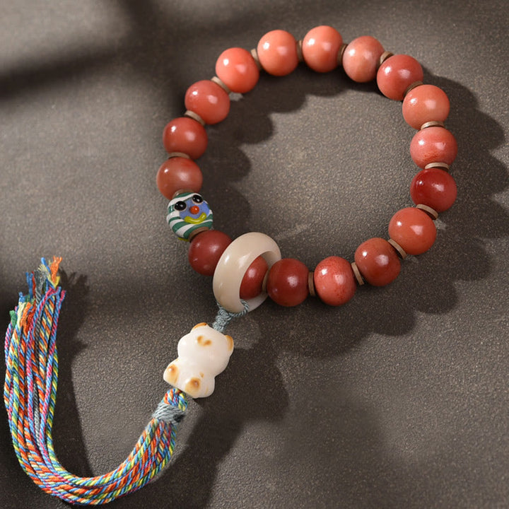 Bracelet porte-bonheur tibétain en perles dzi en Buddha Stones