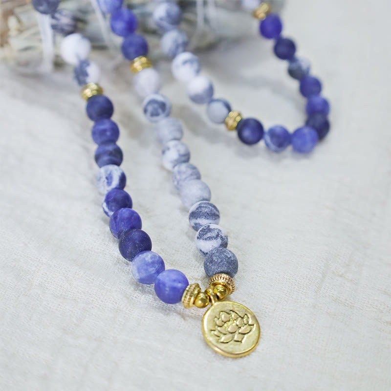 Bracelet Mala avec pendentif lotus en 108 perles de jaspe Picasso naturel et pierre bleue Buddha Stones