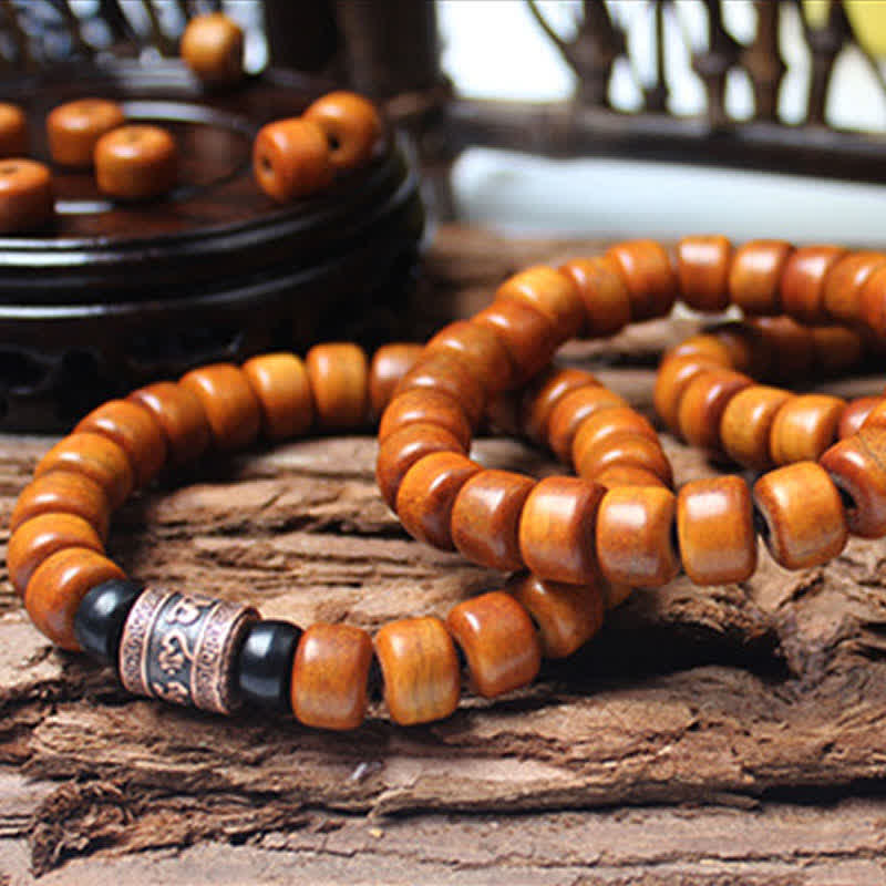 Bracelet de force en Buddha Stones, perles d'os tibétaines Om Mani Padme Hum
