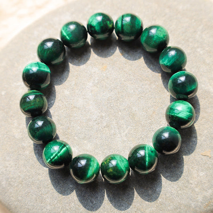 Bracelet énergétique de guérison et de croissance en œil de tigre Buddha Stones