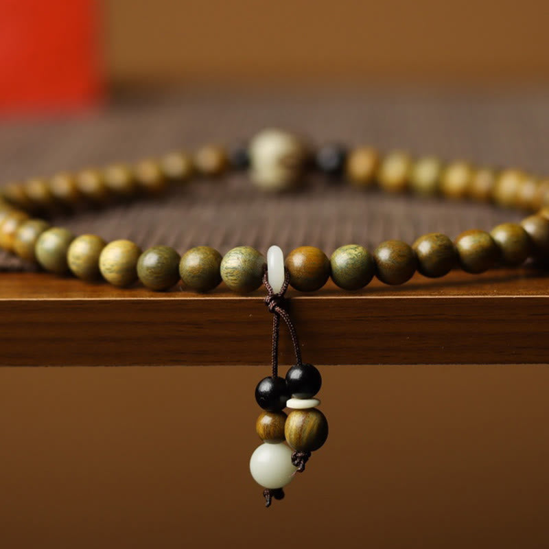 Bracelet double tour apaisant en bois de santal vert et graines de lotus Buddha Stones