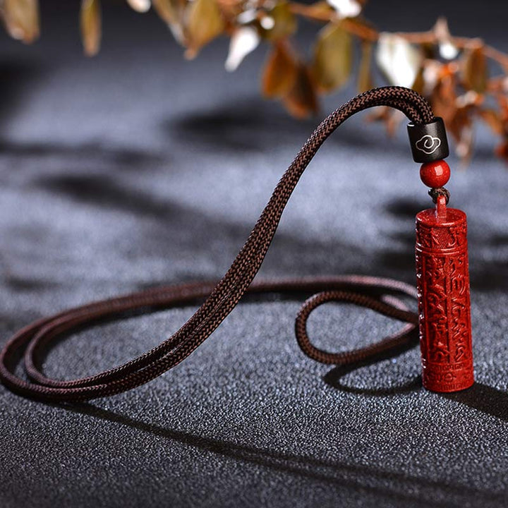 Collier de concentration de mantra tibétain en Buddha Stones en cinabre