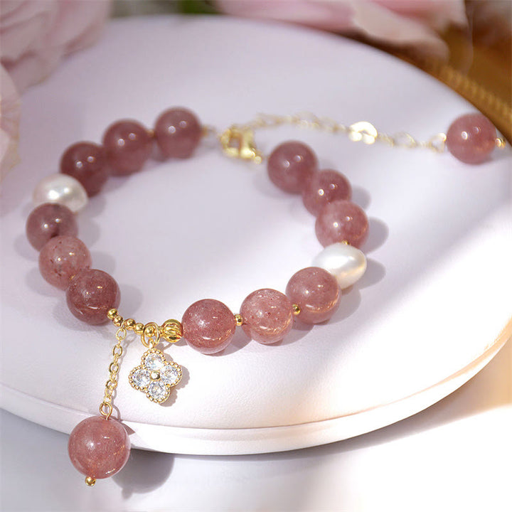 Bracelet d'amour en perles de quartz fraise naturelles et trèfle à quatre feuilles Buddha Stones