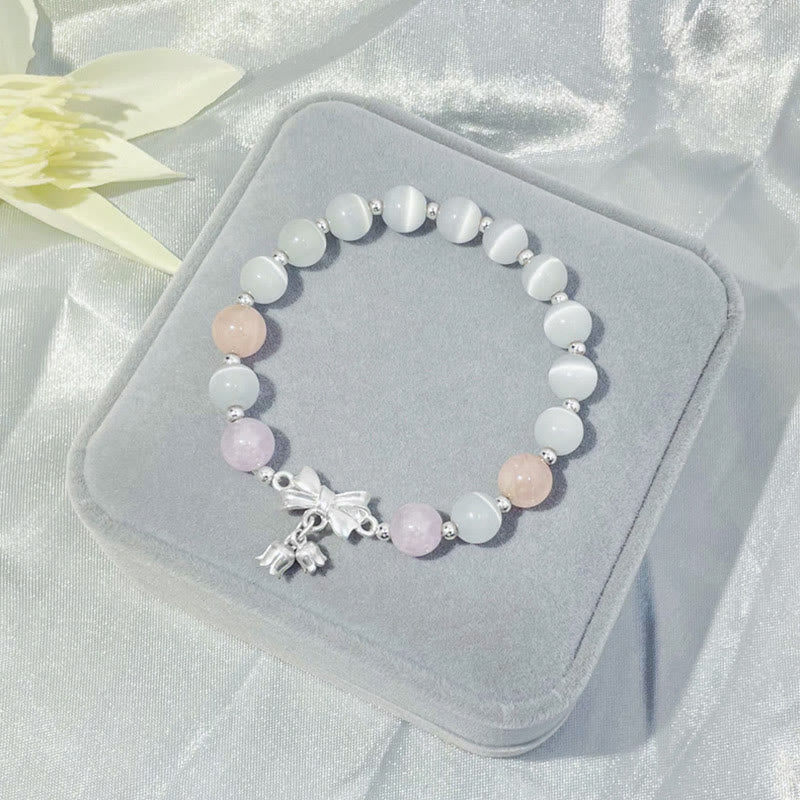 Bracelet à breloques en forme de rosette avec œil de chat, lavande et améthyste de Buddha Stones