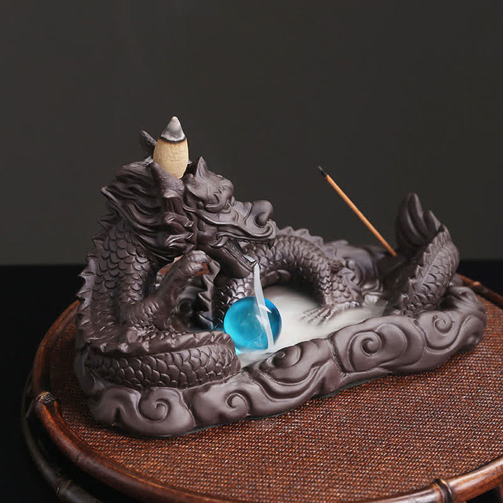 Brûleur d'encens de protection de fleur de dragon jouant à la balle