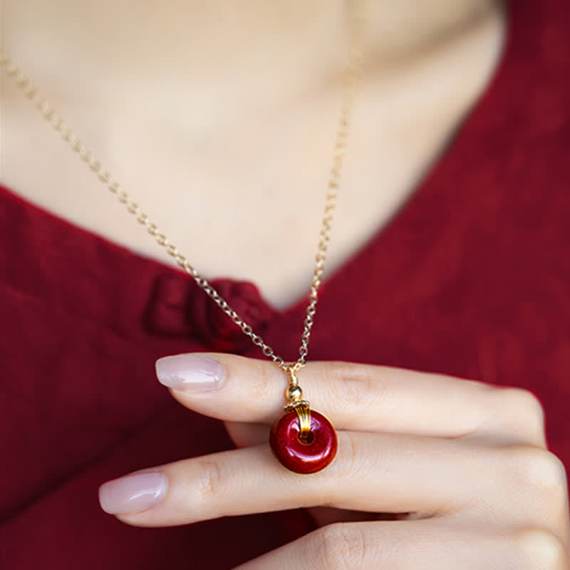 Collier avec pendentif en pierre de cinabre et boucle de paix en Buddha Stones