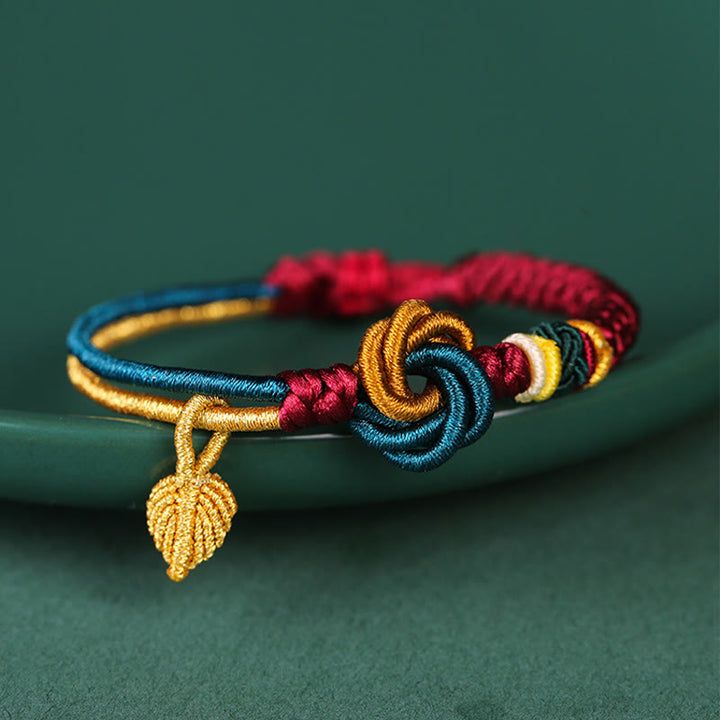 Bracelet tibétain en corde porte-bonheur fait main avec nœud mandala et Buddha Stones