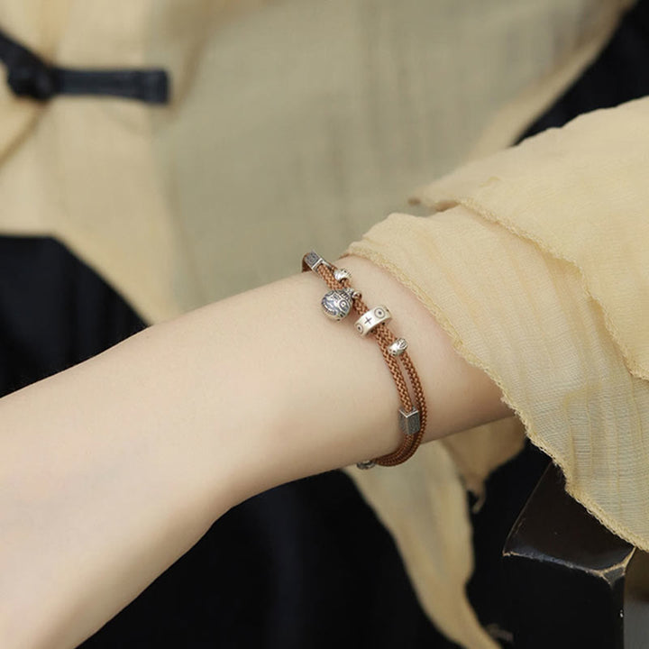 Bracelet tressé artisanal en argent sterling 925 Buddha Stones et or représentant une bête avaleuse de poisson Koi