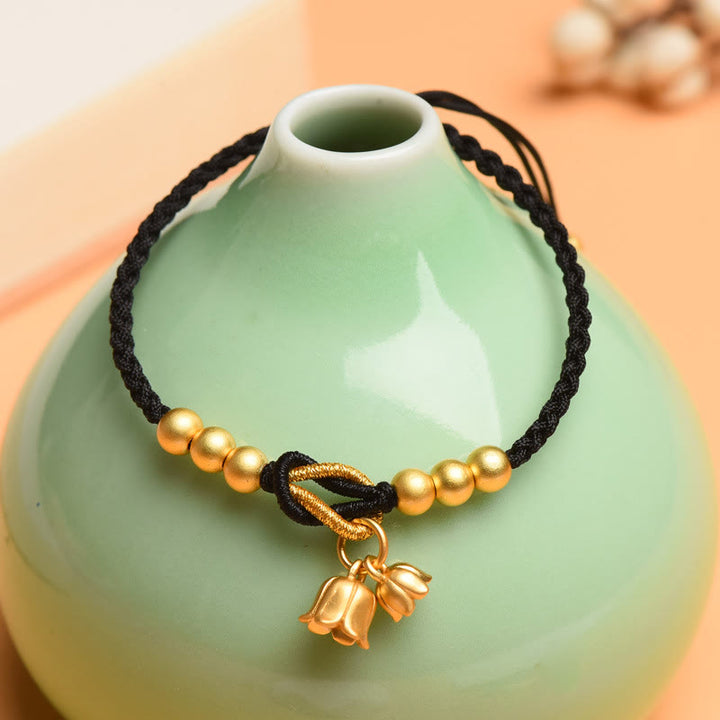 Bracelet tressé fait main en forme de fleur de muguet avec breloque de Buddha Stones