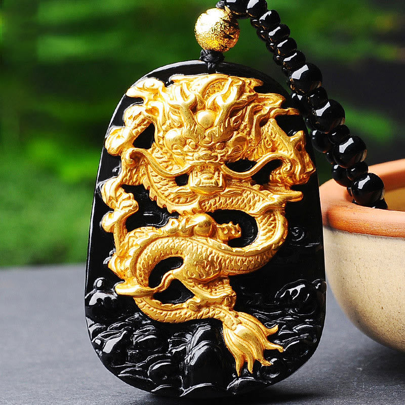 Collier pendentif porte-bonheur en obsidienne de dragon plaqué or 18 carats de Buddha Stones - image 1