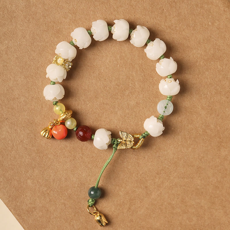 Bracelet d'harmonie et de paix en perles de citrouille et de lotus en Buddha Stones naturelles