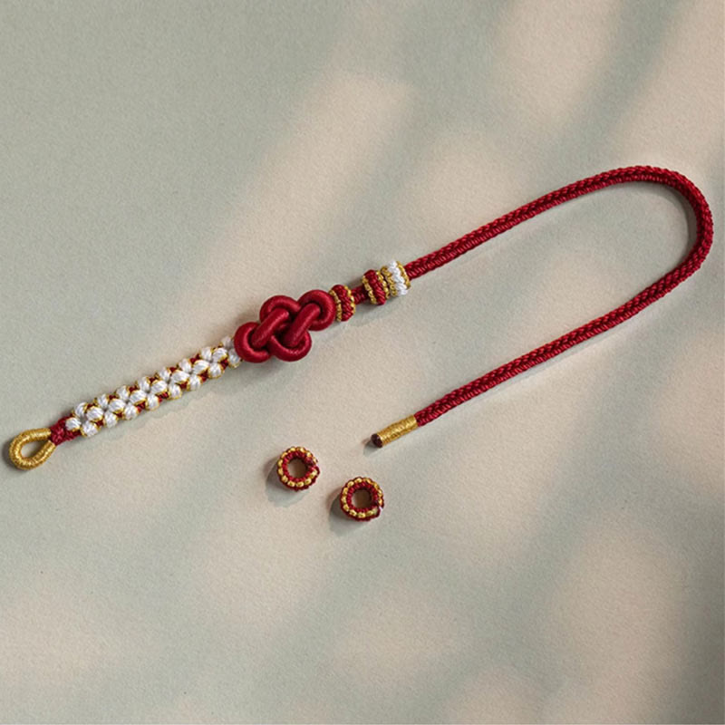 Bracelet porte-bonheur en corde avec breloque en fleur de pêcher et nœud d'amour véritable fait à la main par Buddha Stones