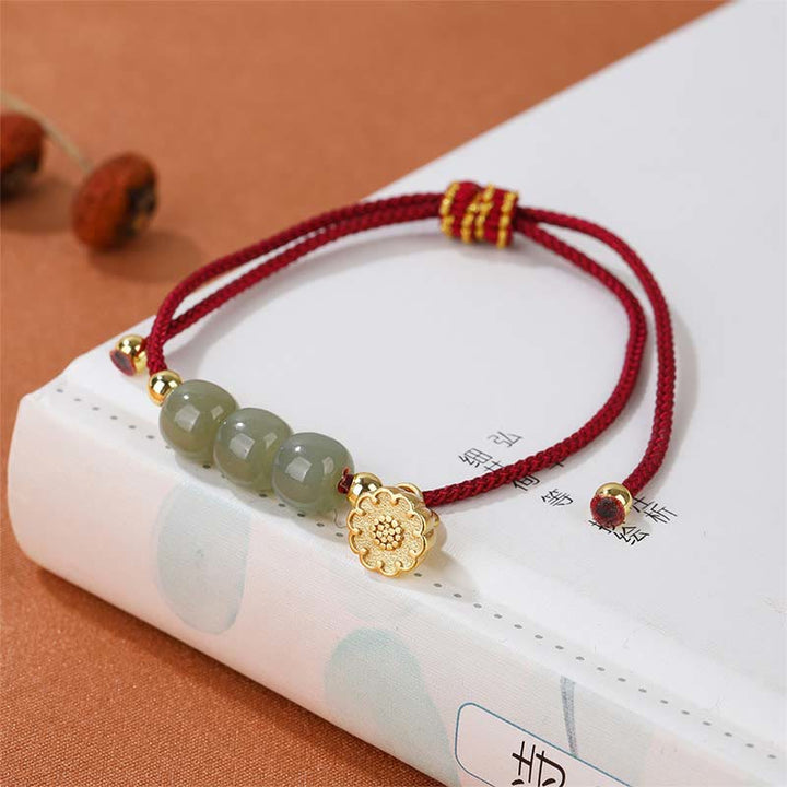 Bracelet tressé fait main en Buddha Stones de jade Hetian et gousse de lotus pour la prospérité et la chance
