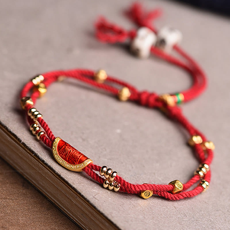 Bracelet en corde rouge tressée porte-bonheur en forme de boulettes de cinabre faites à la main par Buddha Stones