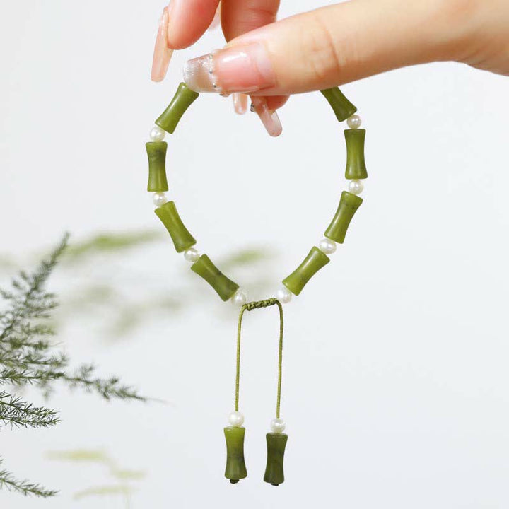 Bracelet en Buddha Stones avec motif bambou et péridot naturel