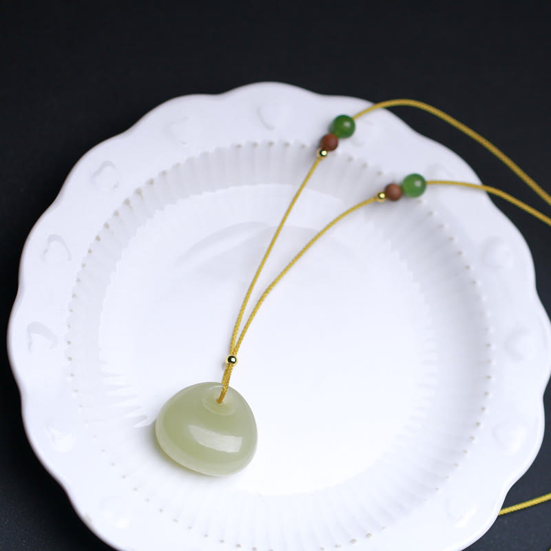 Collier pendentif en jade naturel Hetian à motif de petit sac pour la prospérité