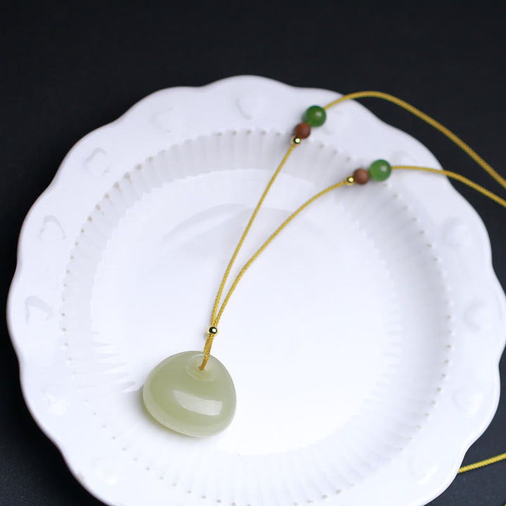 Collier pendentif en jade naturel Hetian à motif de petit sac pour la prospérité