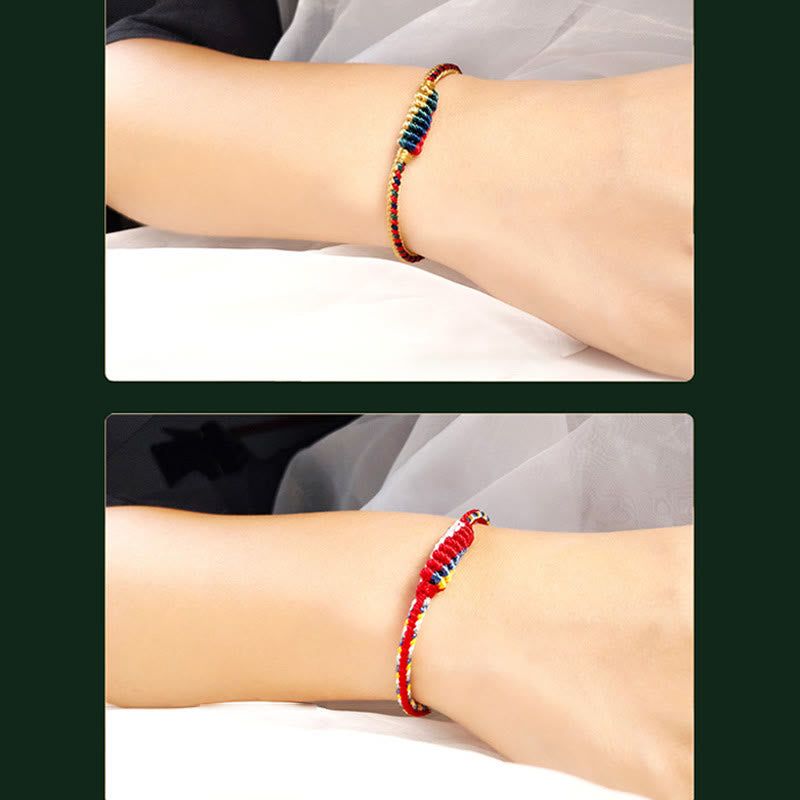 Bracelet de protection tressé à huit fils en Buddha Stones tibétain fait à la main avec roue de prière et nœud de paix