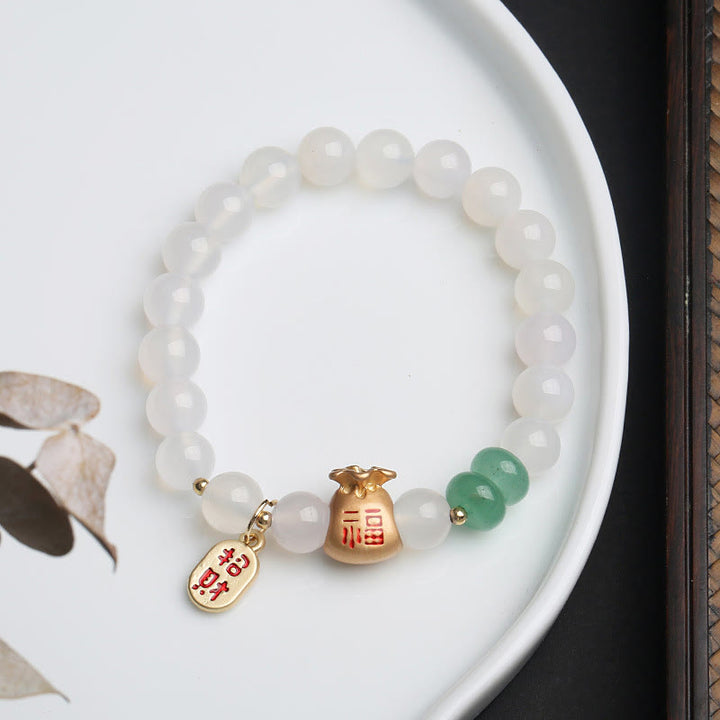 Buddha Stones Agate blanche naturelle Agate rouge Sac d'argent Caractère Fu Trèfle à quatre feuilles Bracelet de protection