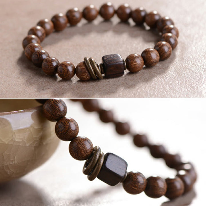 Bracelet de spiritualité en bois de Phoebe Zhennan Buddha Stones
