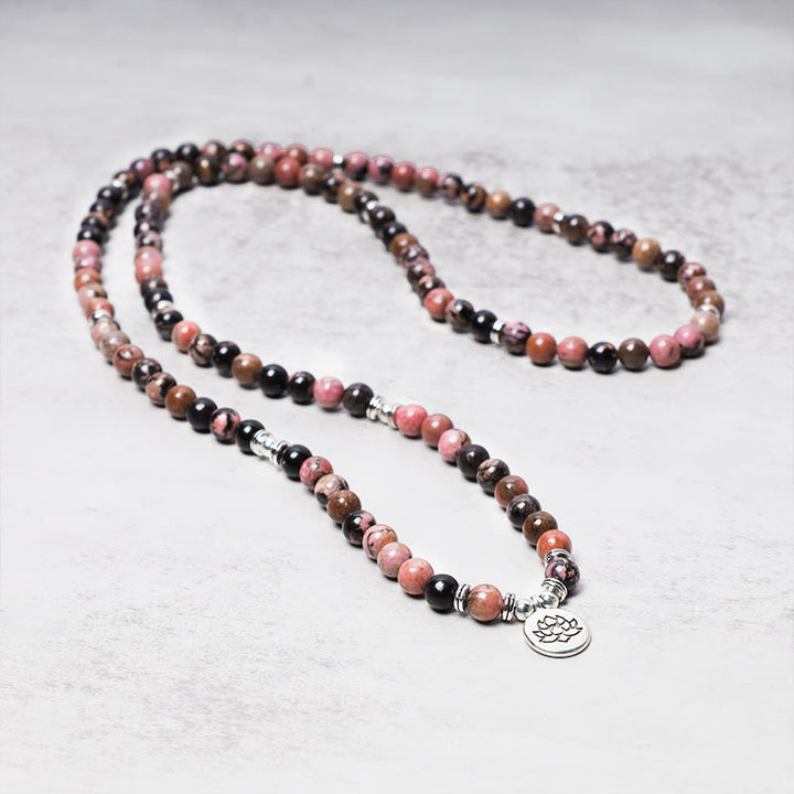 Bracelet Mala 108 Buddha Stones en rhodonite et lotus avec énergie de compassion