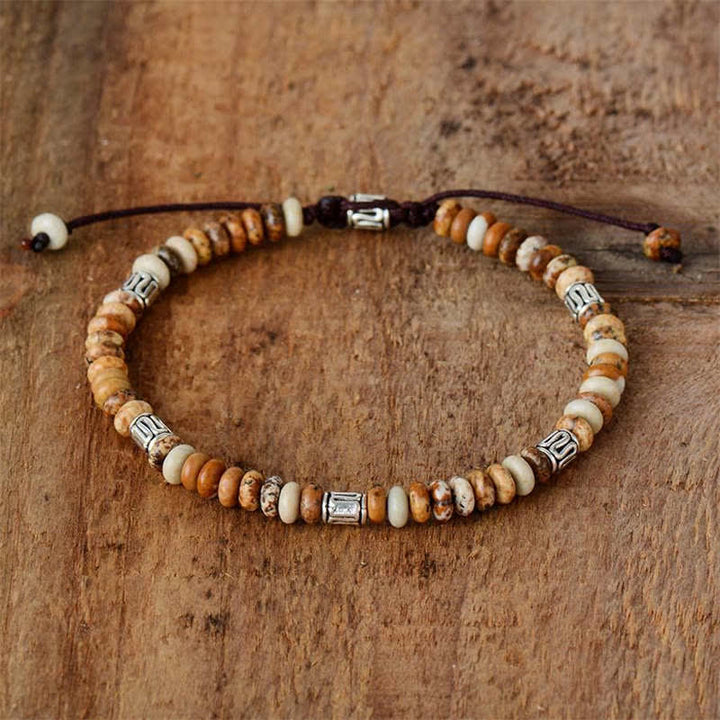 Bracelet en fil de perles positives en jaspe photo