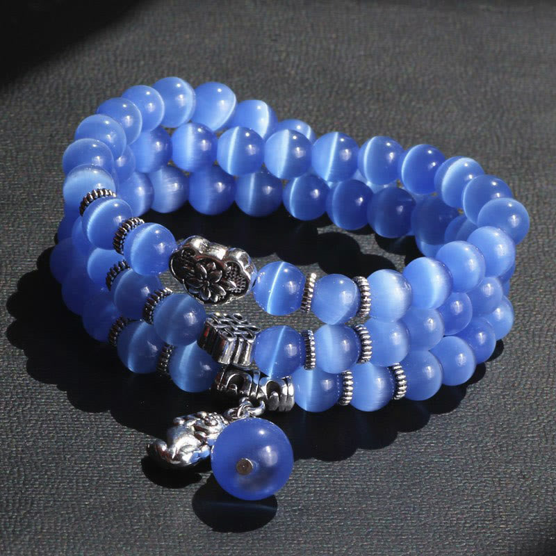 Bracelet triple tour de soutien PiXiu œil de chat en Buddha Stones