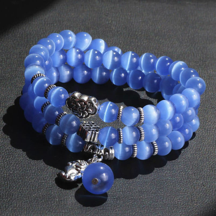 Bracelet triple tour de soutien PiXiu œil de chat en Buddha Stones