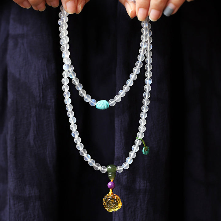 Bracelet de guérison en cristal de 108 Buddha Stones de Mala en pierre de lune, ambre, lotus, turquoise