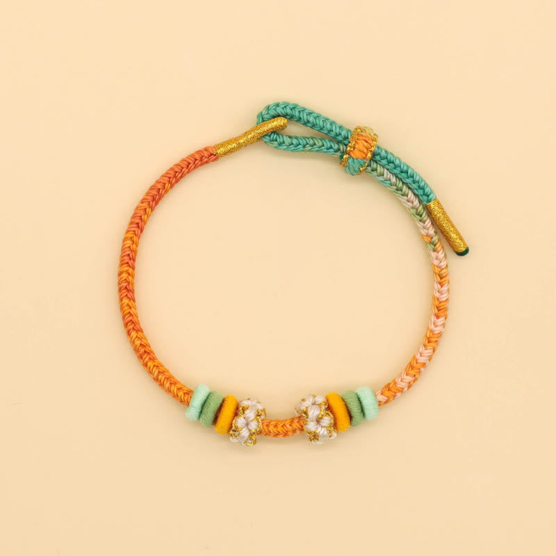 Bracelet tressé fait main en corde porte-bonheur avec nœud de paix à huit fils et nœud de fleur de pêcher en Buddha Stones - image 9