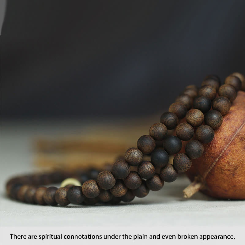Bracelet Mala Tarakan en or 999 et 108 Buddha Stones en bois d'agar et ambre pour éloigner les mauvais esprits