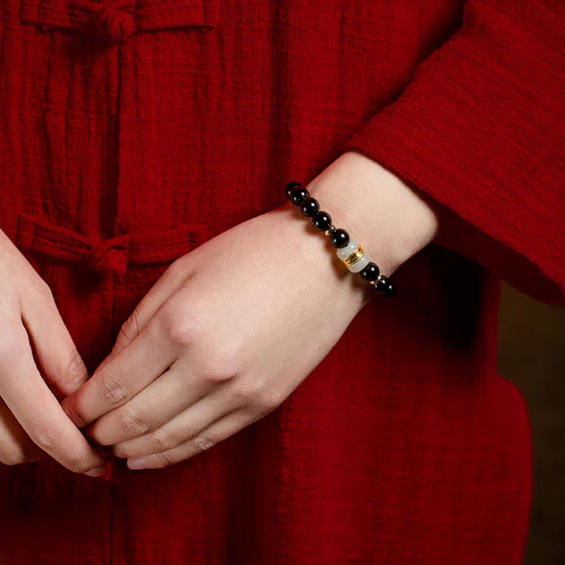 Bracelet magnétique pour couple en obsidienne Buddha Stones et jade Om Mani Padme Hum