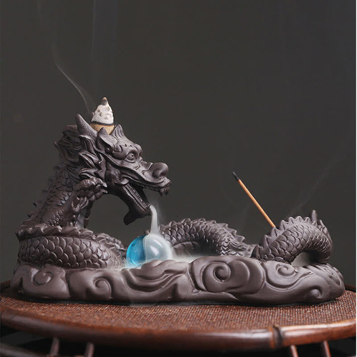 Brûleur d'encens de protection de fleur de dragon jouant à la balle
