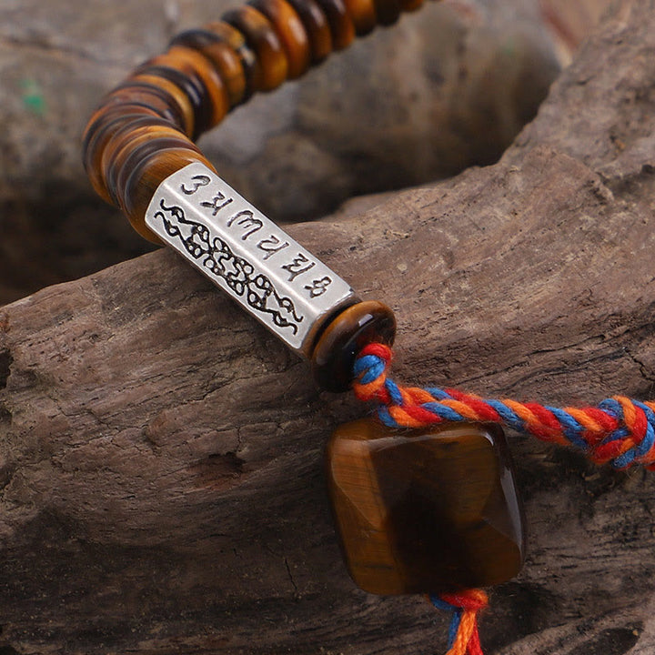 Bracelet de protection et de pouvoir tibétain en Buddha Stones et œil de tigre Om Mani Padme Hum
