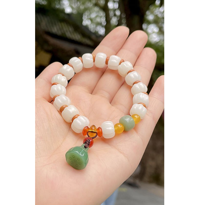 Bracelet en perles de citrouille gravées en agate rouge Bodhi Calme Harmonie Bodhi Graines naturelles Lotus