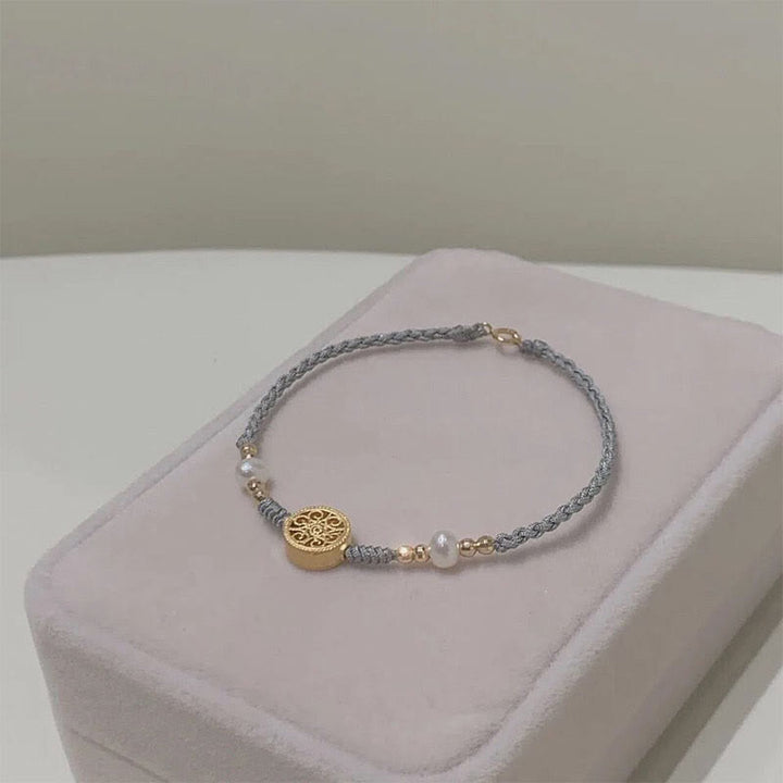 Bracelet tressé en corde bleue avec perles et arbre de fortune en cuivre et Buddha Stones