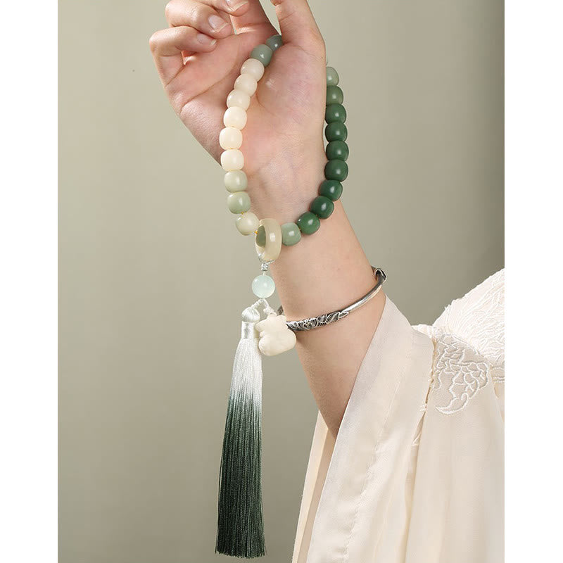 Buddha Stones Dégradé Naturel Graine de Bodhi Fortune Sac d'Argent Sagesse de Lotus Gland Poignet Mala