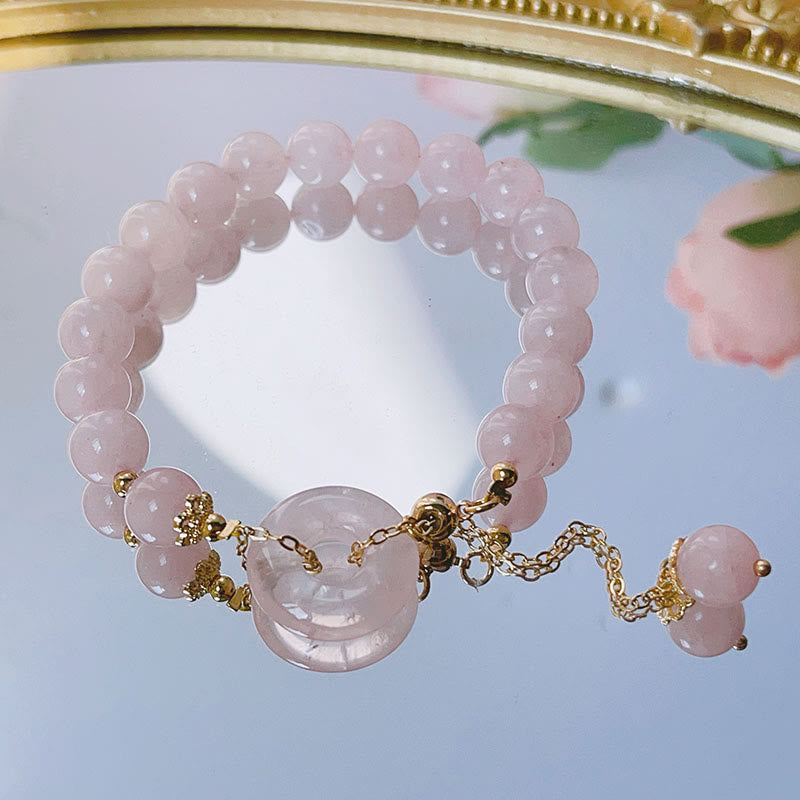 Bracelet à breloques en cristal rose naturel avec boucle de paix et Buddha Stones - image 1