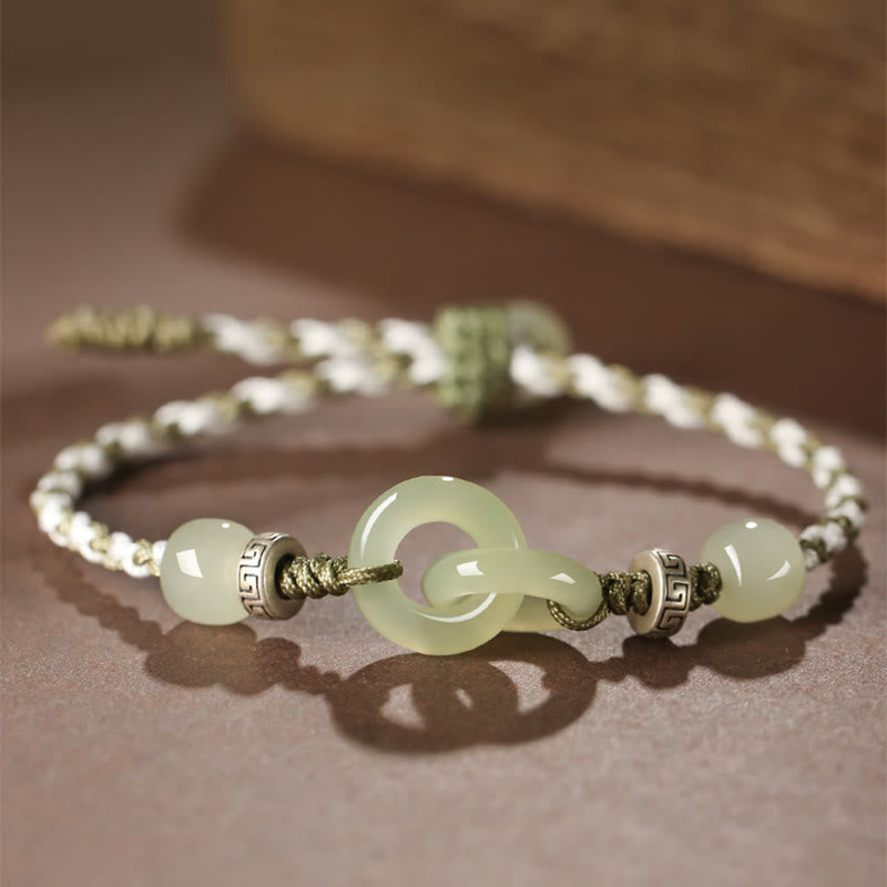 Bracelet tressé avec boucle de paix et porte-bonheur en jade naturel Hetian de Buddha Stones