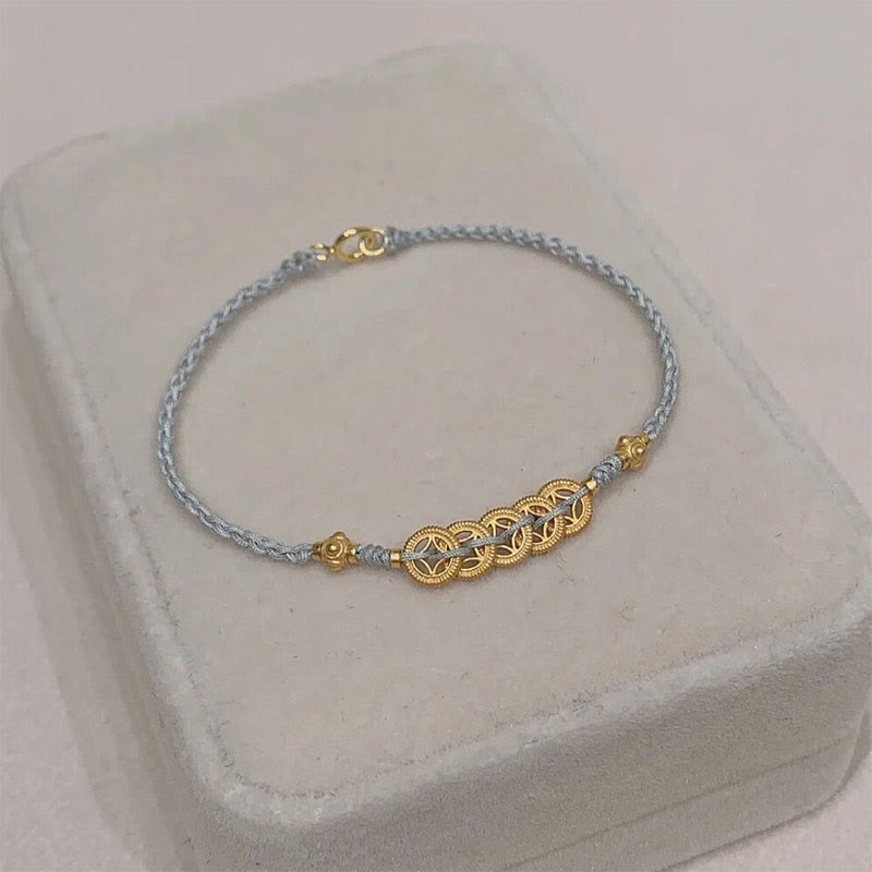Bracelet tressé en corde bleue avec perles et arbre de fortune en cuivre et Buddha Stones