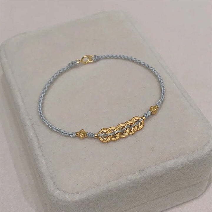 Bracelet tressé en corde bleue avec perles et arbre de fortune en cuivre et Buddha Stones