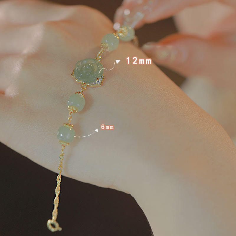 Bracelet porte-bonheur en jade Hetian plaqué or 14 carats de Buddha Stones