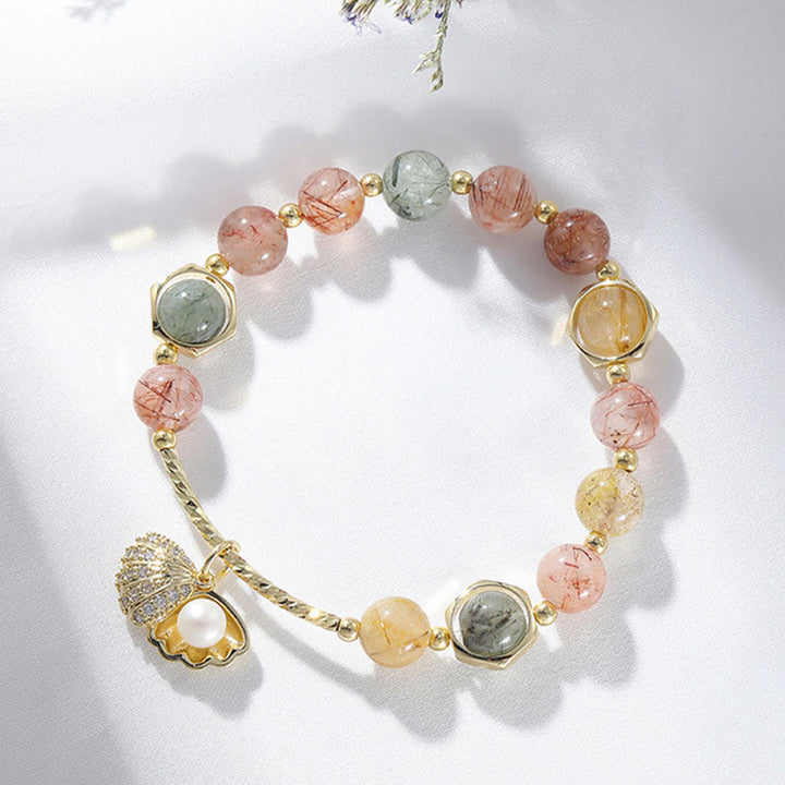 Bracelet de perles de protection en coquillage de quartz rutile coloré naturel de Buddha Stones