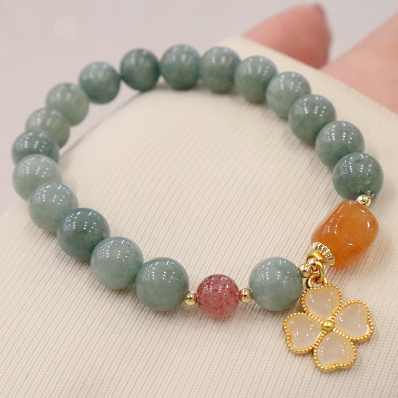 Bracelet de prospérité avec breloque en trèfle à quatre feuilles en jade et Buddha Stones