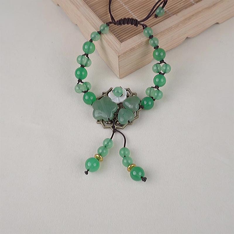 Bracelet porte-bonheur en jade vert naturel Buddha Stones et fleur pendante
