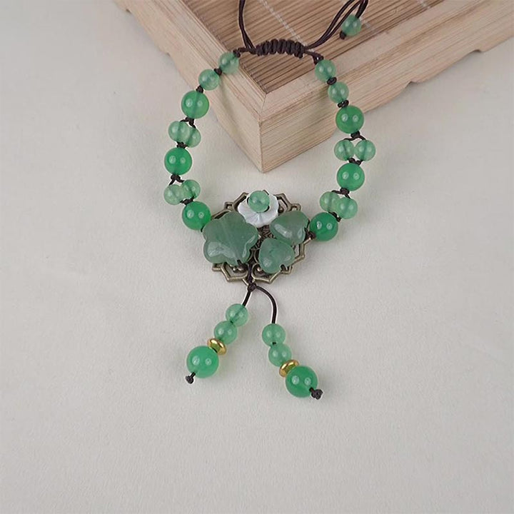 Bracelet porte-bonheur en jade vert naturel Buddha Stones et fleur pendante