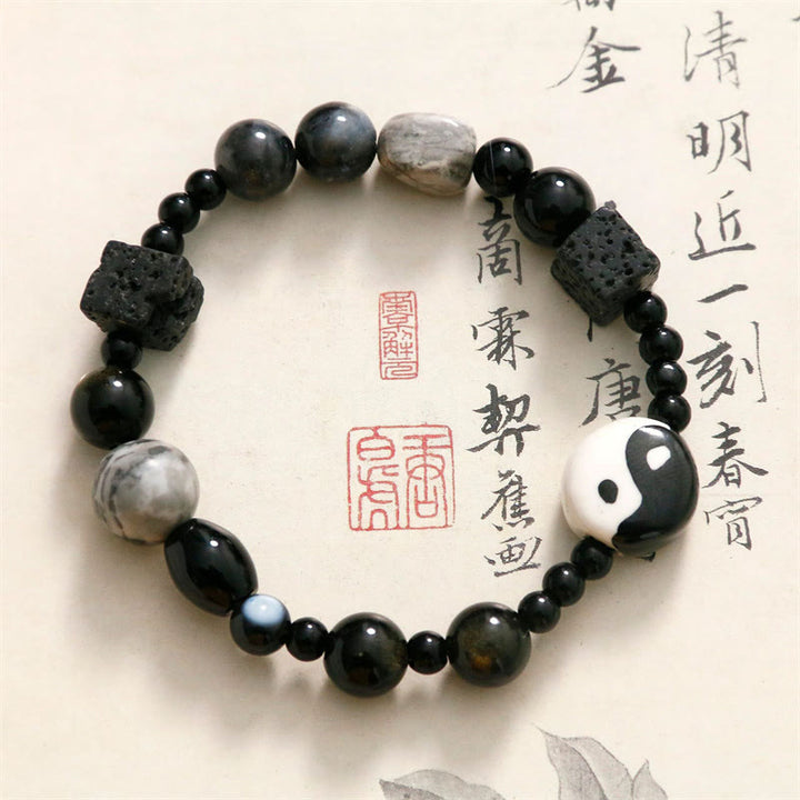 Bracelet de protection de la fortune Yin Yang en perles de jaspe Picasso et onyx noir Buddha Stones